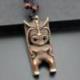Collier mixte homme / femme avec pendentif Tiki - style polynésien