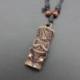 Collier mixte homme / femme avec pendentif Tiki - bijou maori Hawaï Tahiti