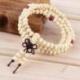 Bracelet Tibétain, Mala en perles de bois 6mm + noeud sans fin. Coloris beige