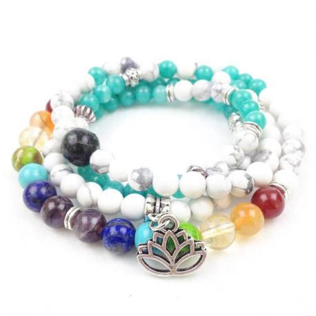 Mala tibétain en Howlite, pierres des 7 chakras et symbole Fleur de lotus
