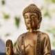 Statuette Bouddha or assis finition dorée patinée 14cm