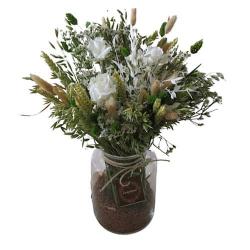 Vincennes - Bouquet de fleurs séchées avec vase.