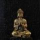 Statuette Bouddha assis finition dorée patinée 12cm