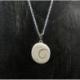 Collier pendentif coquillage Œil de Sainte Lucie + chaîne acier